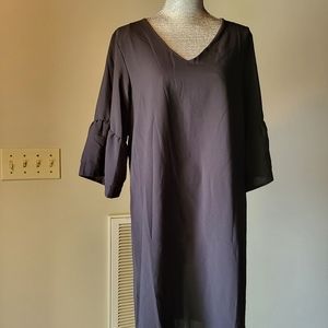 BELONGSCI, short black dress NWT sz:large. Bell sleeves. Material black chiffon.